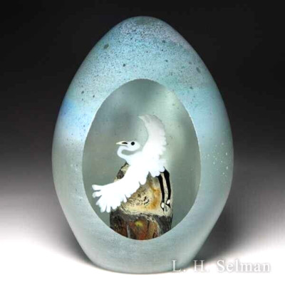 Orient & Flume 1981 white crane overlay egg-shaped paperweight by Ed Seaira-image