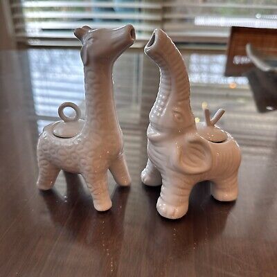 Pottery Barn elephant and giraffe set oil vinegar-image