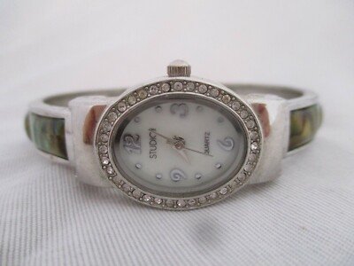 Studio Time Wristwatch Silver Tone Iridescent Cuff Band Oval Shaped White Face-image