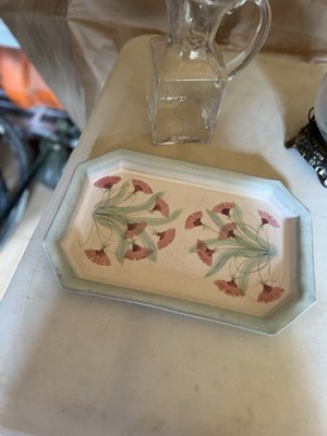 handmade and painted terracotta chip and dip set with a pink floral design. -image