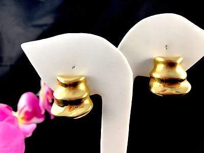 STRIKING 1994 CLARA STUDIO FOR ASYMMETRY GOLD-TONE BELL SHAPED CLIP EARRINGS-image