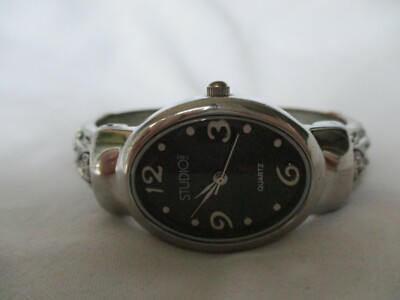 Studio TIME Watch Silver Toned & Black Cuff Band Oval Shaped Face Elegant Style-image
