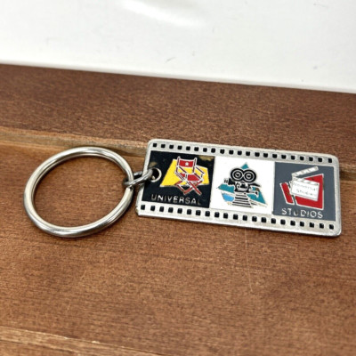 Vintage Universal Studios Name JACK Film Reel Shaped Metal Theme Park Keychain-image